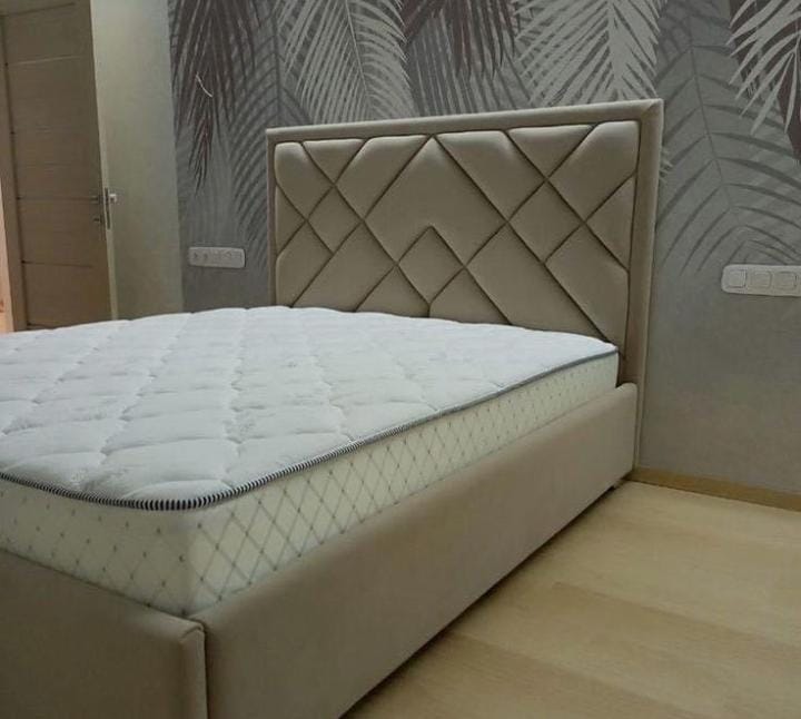White upholstered bed